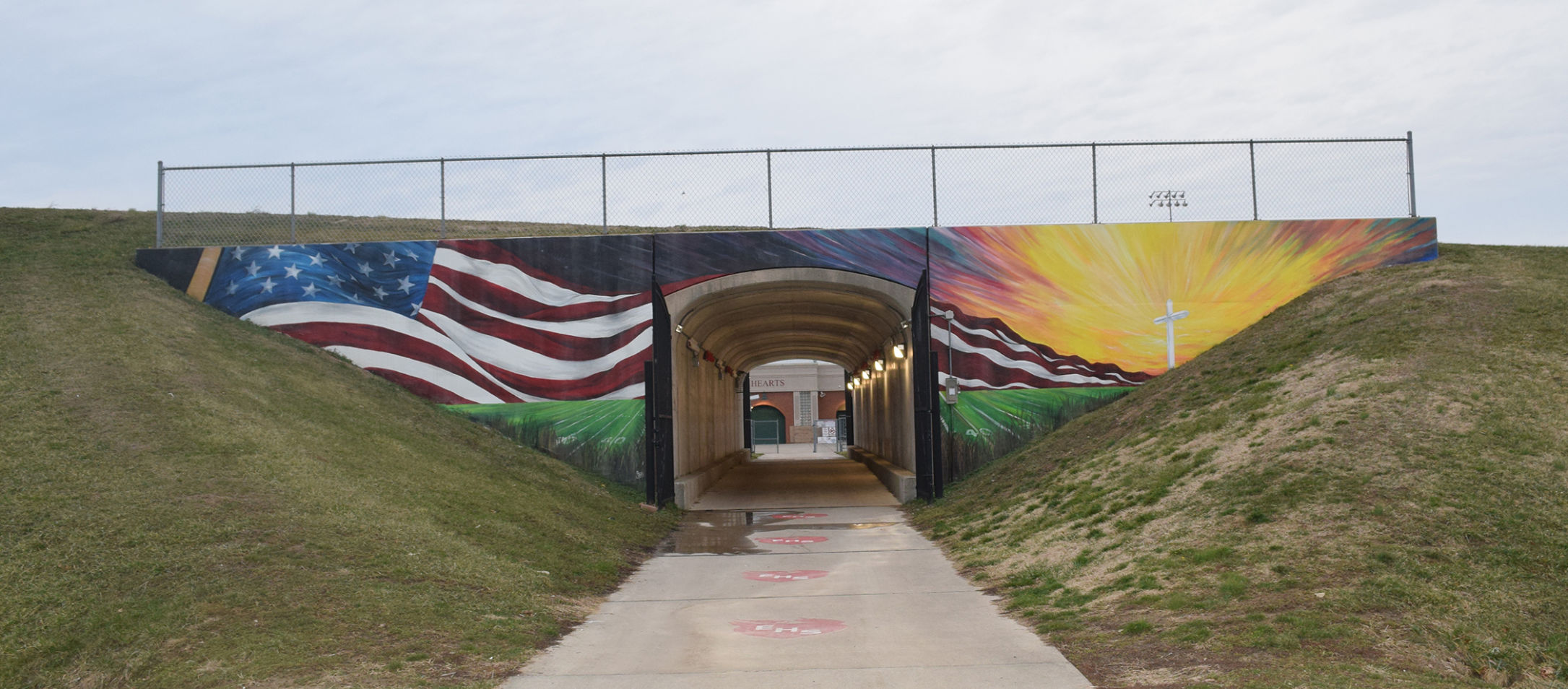 Support for mural with a cross brings community to City Hall